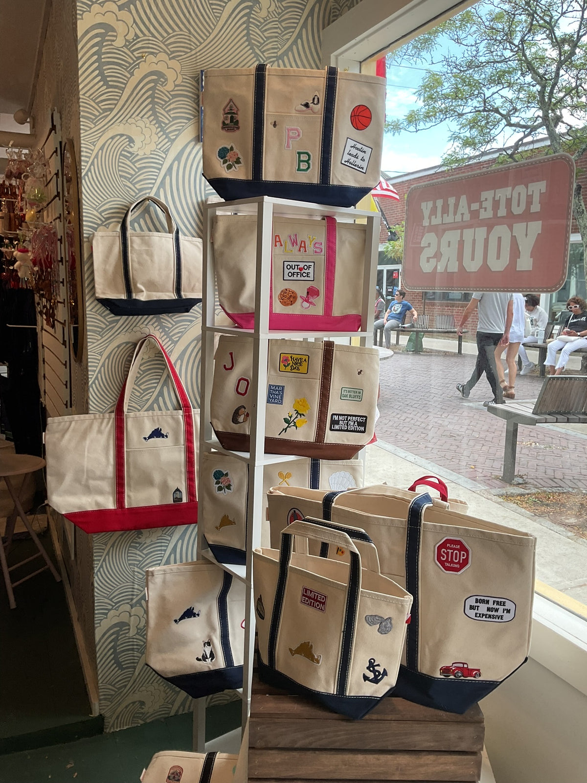Monogram patch totes on a shelf at the Oak Bluffs studio