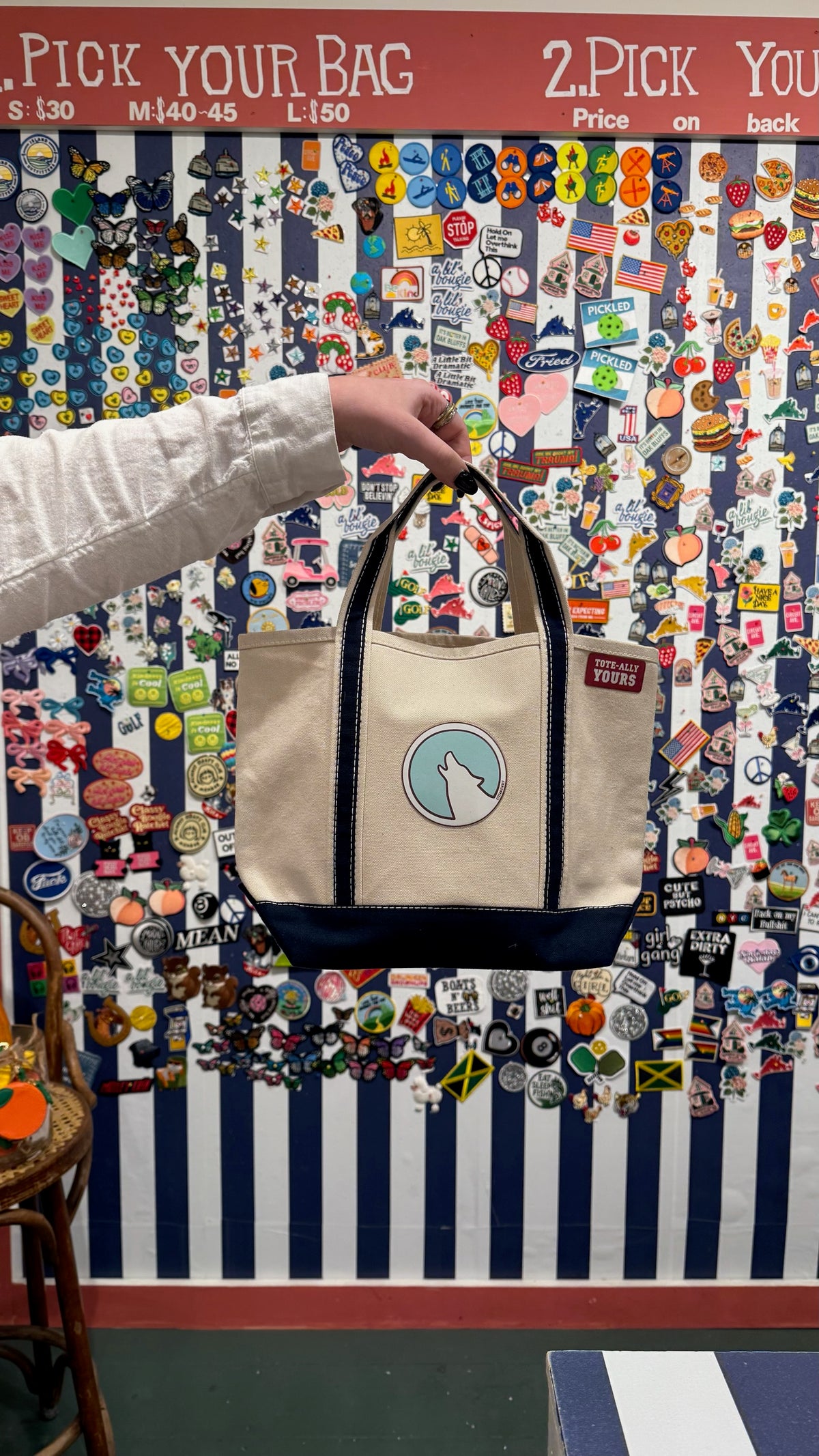 Small navy tote with a howling wolf patch